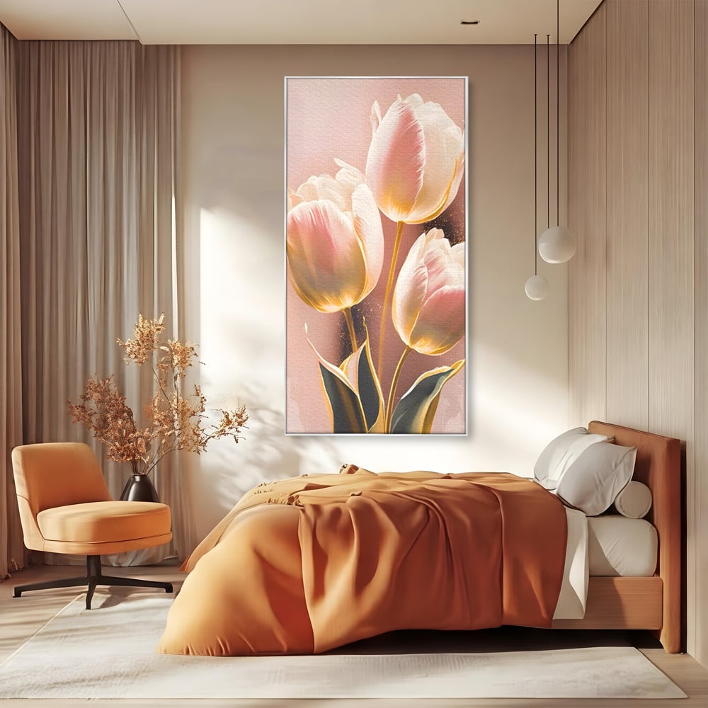 Tablou canvas cu tablou canvas cu trei lalele roz, in rama de aluminiu argintiu, pe perete intr-un dormitor